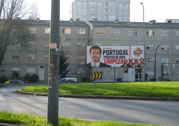 A campaign billboard for the far-right Chega party, calling for a political 