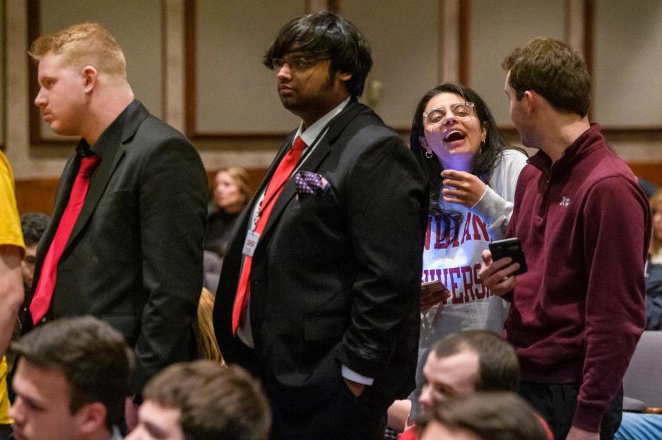 Tara Layous laughs at what Ann Coulter was saying April 1 as she waits her turn during the question and answer portion of Coulter&#39;s appearance at the Indiana Memorial Union.