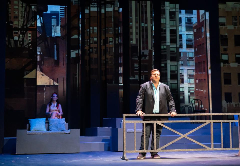 Bobby, played by Sam Ramirez, looks out over the city in a scene from "Company" at the Croswell Opera House.