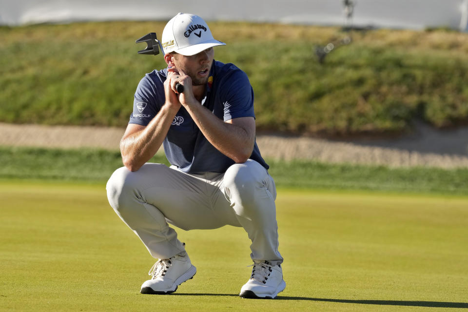 Sam Burns reeacts to a missed birdie putt on the 18th green during the final round of the Valspar Championship golf tournament Sunday, March 20, 2022, at Innisbrook in Palm Harbor, Fla. Burns won the tournament in a playoff. (AP Photo/Chris O'Meara)