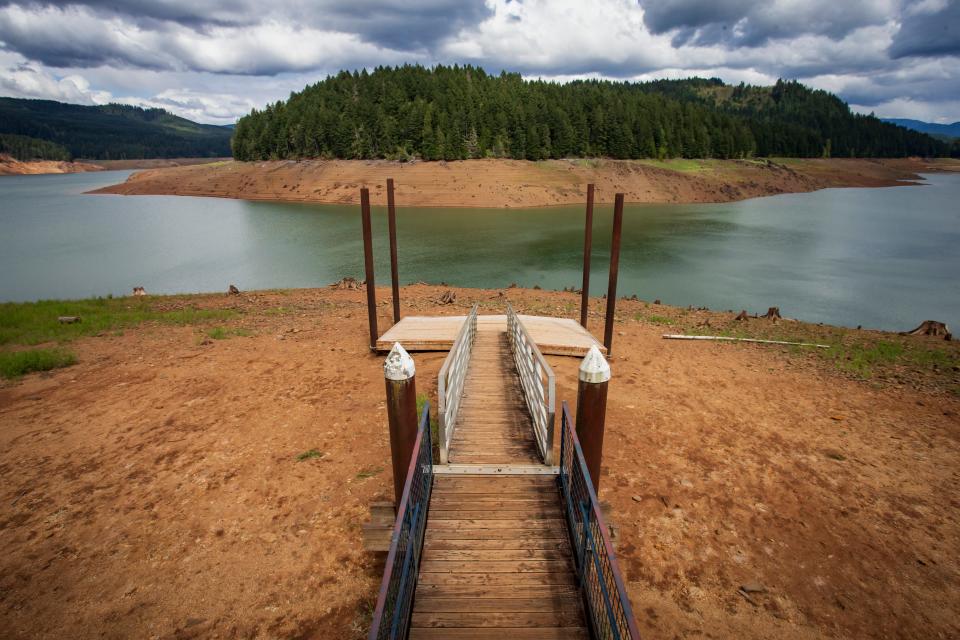 The water level sits far below a swim dock at the Winberry Day-Use Area at Fall Creek Reservoir on May 9.