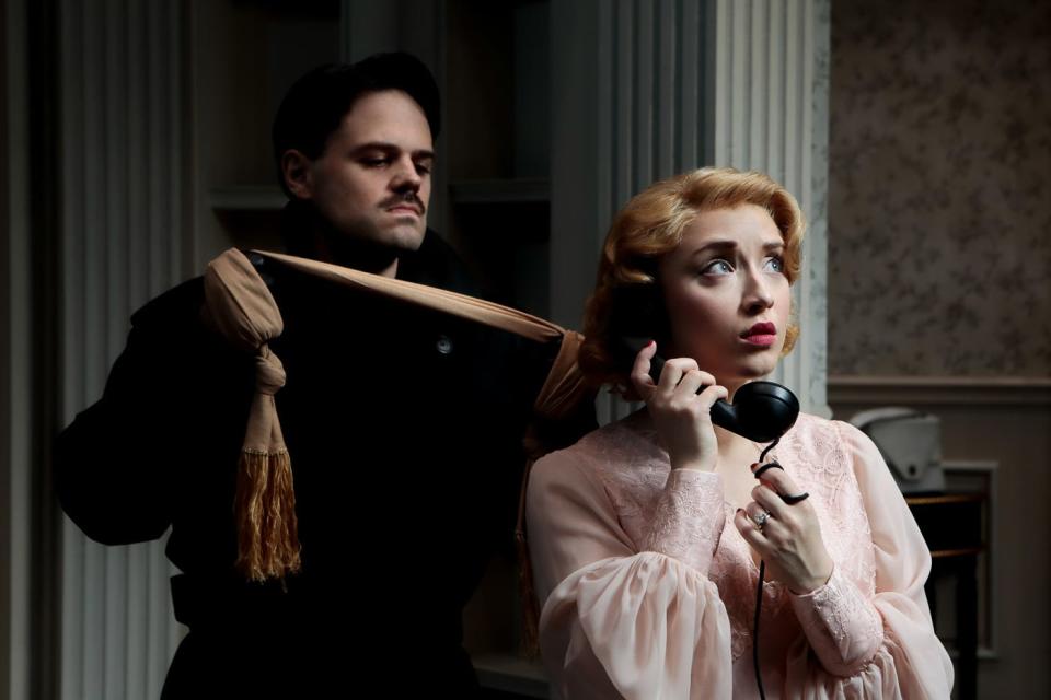 Brooke Turner, right, plays a wealthy socialite who isn’t quite aware that her husband has hired someone (played by Mikhail Roberts) to kill her in a new stage version of “Dial M for Murder” at Asolo Repertory Theatre.