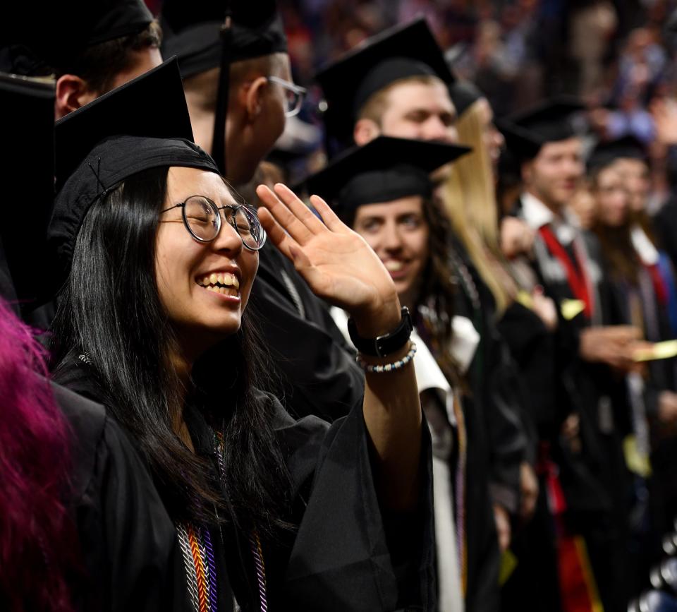 WORCESTER - Caitlin Ho of Quincy laughs during Worcester Polytechnic Institute's Undergraduate Commencement Ceremony at DCU Center on Friday.
