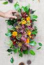 <p>To keep with the au naturel theme, head straight to your backyard to pull together materials to make this colorful display. </p><p><em><a href="https://www.apieceofrainbow.com/diy-fall-thanksgiving-centerpiece/" rel="nofollow noopener" target="_blank" data-ylk="slk:Get the tutorial at A Piece of Rainbow »;elm:context_link;itc:0;sec:content-canvas" class="link ">Get the tutorial at A Piece of Rainbow »</a></em></p>