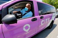 Via ride-sharing van operates in partnership with city-run bus system in Jersey City