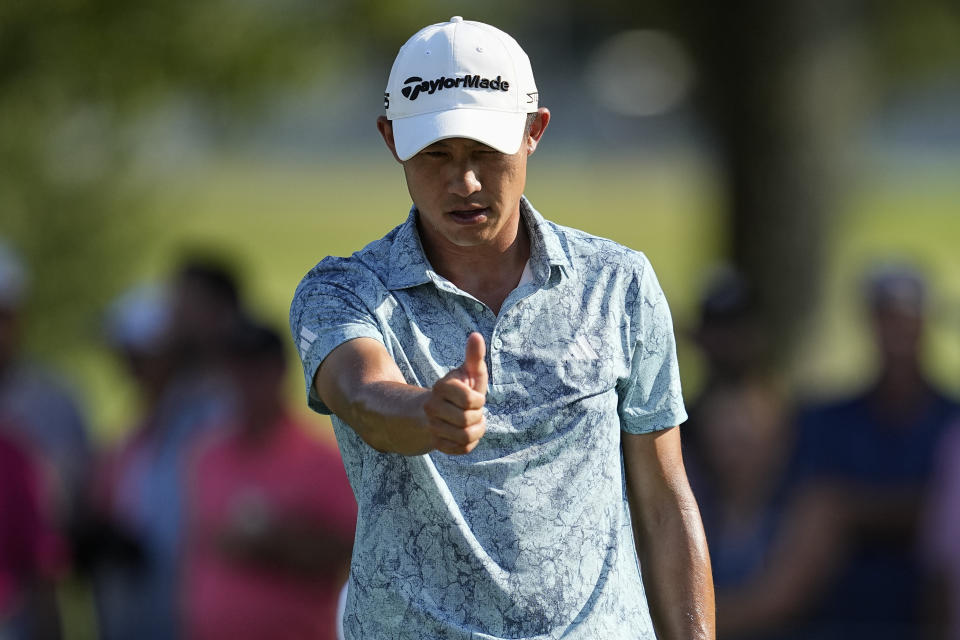 Collin Morikawa lines up a putt on the 17th green during the second round of the Tour Championship golf tournament, Friday, Aug. 25, 2023, in Atlanta. (AP Photo/Mike Stewart)