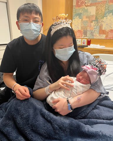 <p>Courtesy of BethIsrael Deaconess Medical Center</p> Baby Ophelia with parents Min Li and Huaien Wang at Beth Israel Deaconess Medical Center in Boston