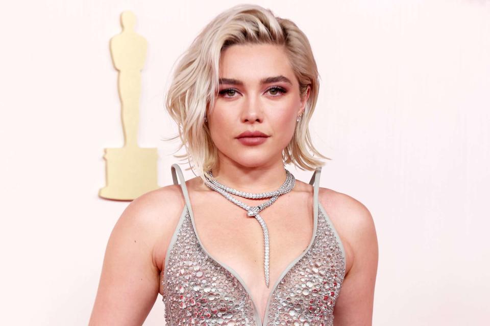 <p>Kevin Mazur/Getty </p> Florence Pugh at 2024 Oscars