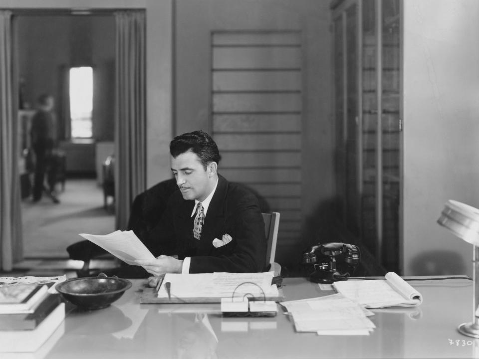 Cedric Gibbons at his desk.