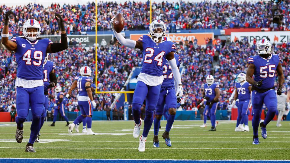 Buffalo Bills cornerback Kaiir Elam (24), center, celebrates after his interception during the second half of an NFL wild-card playoff football game against the Miami Dolphins, Sunday, Jan. 15, 2023, in Orchard Park, N.Y. (AP Photo/Jeffrey T. Barnes)