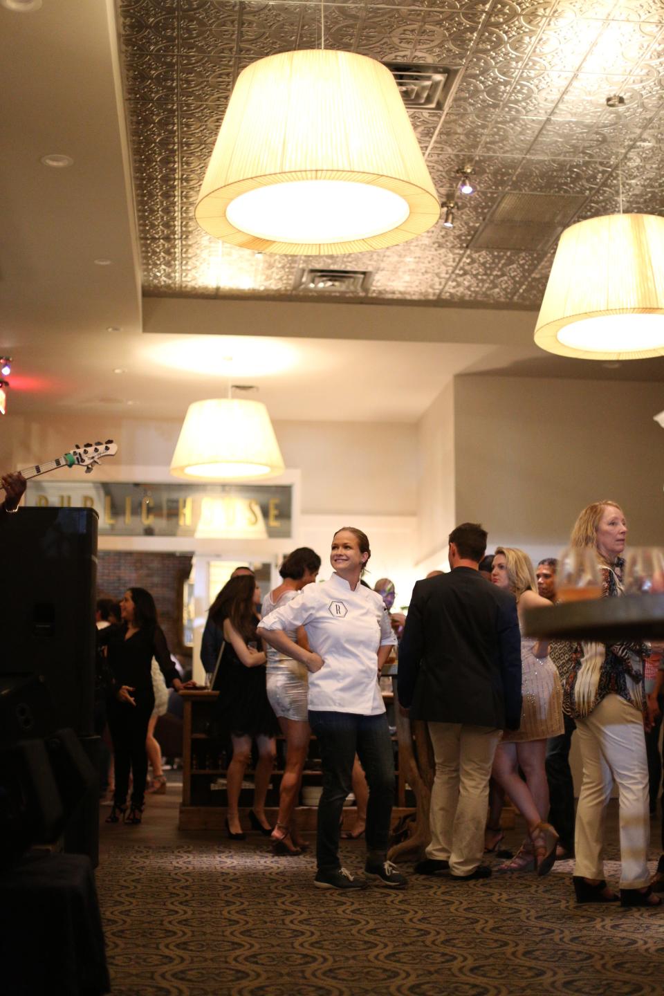 Chef Lindsay Autry takes in the scene her restaurant The Regional's housewarming party in the fall of 2016. The restaurant closed in October 2023, due to the economic aftershocks of the COVID-19 pandemic.