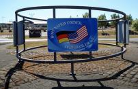 A sign of the Host Nation Council Spangdahlem e.V., which promotes friendly German-American relations, is pictured in front of the main gate of the U.S. Air Base in Spangdahlem near Bitburg