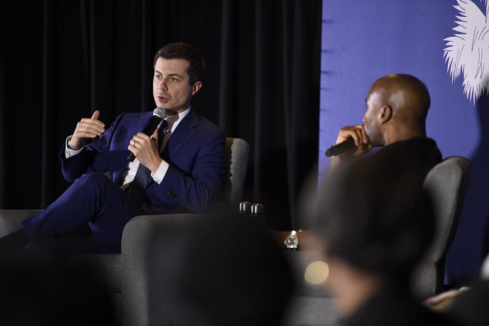 Democratic presidential contender and former South Bend, Indiana, Mayor Pete Buttigieg speaks with Charlamagne Tha God during an event on economic struggles in the black community on Thursday, Jan. 23, 2020, in Moncks Corner, S.C. (AP Photo/Meg Kinnard)