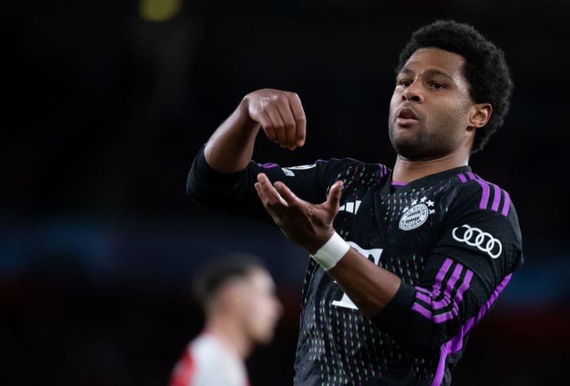 Bayern Munich's Serge Gnabry celebrates his side's first goal of the game during the UEFA Champions League quarter-final, first leg soccer match between Arsenal and Bayern Munich at the Emirates Stadium. Sven Hoppe/dpa