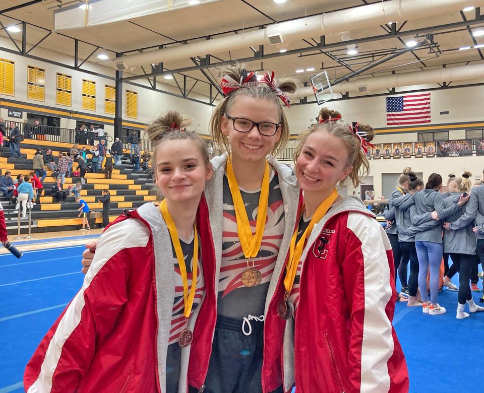 Three Cardinals earned spots on the podium this weekend. Pictured are, from left, Kiraly Schoenauer, Randi Dudek, and Charlotte Calhoun.