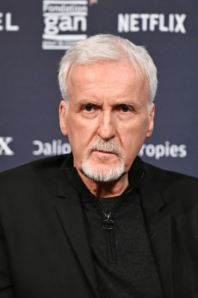 Man in black attire posing at a Netflix event