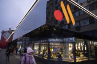 FILE - People line up to visit a newly opened restaurant in a former McDonald's outlet in Bolshaya Bronnaya Street in Moscow, Russia, Wednesday, Jan. 25, 2023. Many foreign companies have left Russia or sold their businesses to local partners at knockdown prices. (AP Photo/Alexander Zemlianichenko, File)