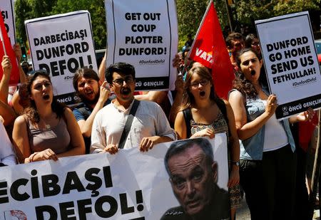 Members of Patriotic Party shout slogans as they demonstrate against the visit of U.S. Chairman of the Joint Chiefs of Staff General Joseph F. Dunford in front of the U.S. Embassy in Ankara, Turkey, August 1, 2016. REUTERS/Umit Bektas