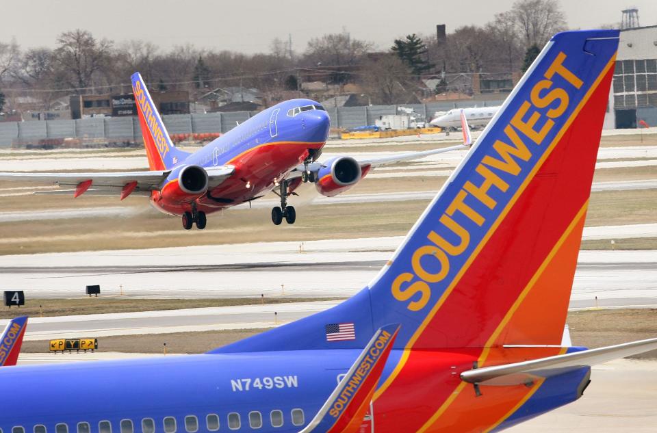 An unidentified couple aboard a Southwest Airlines flight who engaged in a sexual act mid-flight was questioned by local authorities upon landing but will not face charges. In this photo, A Southwest Airlines jet takes off at Midway Airport April 3, 2008 in Chicago, Illinois.