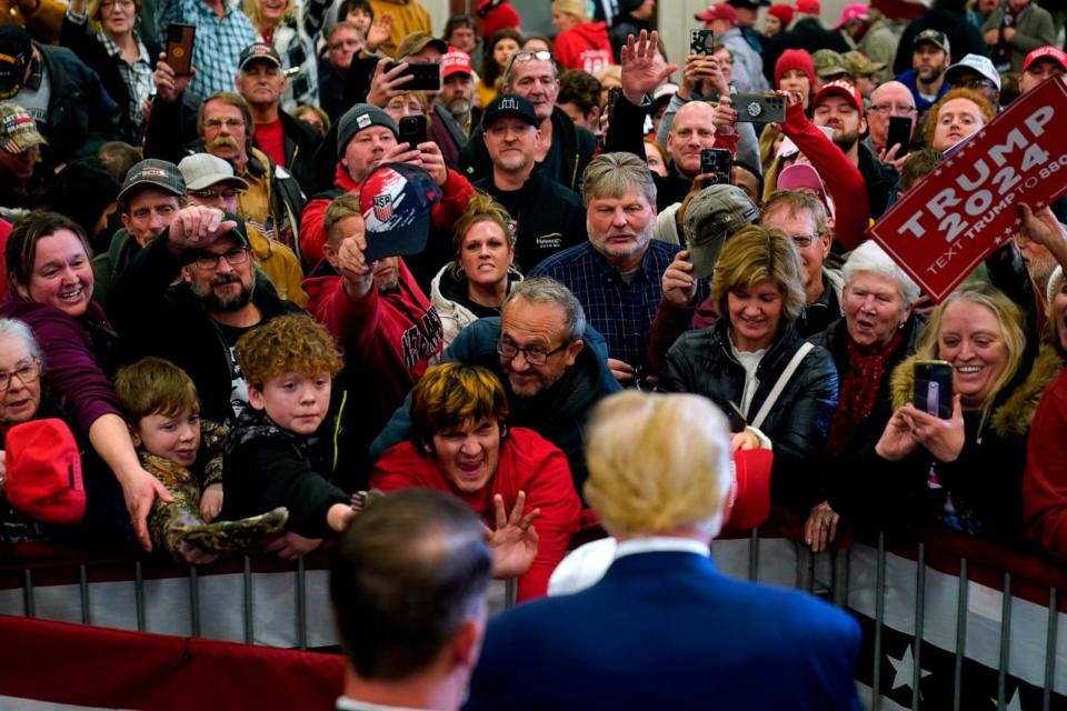 PHOTO: Former President Donald Trump greets supporters during a commit to caucus rally, Jan. 5, 2024, in Mason City, Iowa. (Charlie Neibergall/AP)