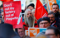 Siemens employees and union members protest outside a meeting of the Siemens works council in Berlin, Germany, November 23, 2017. REUTERS/Hannibal Hanschke