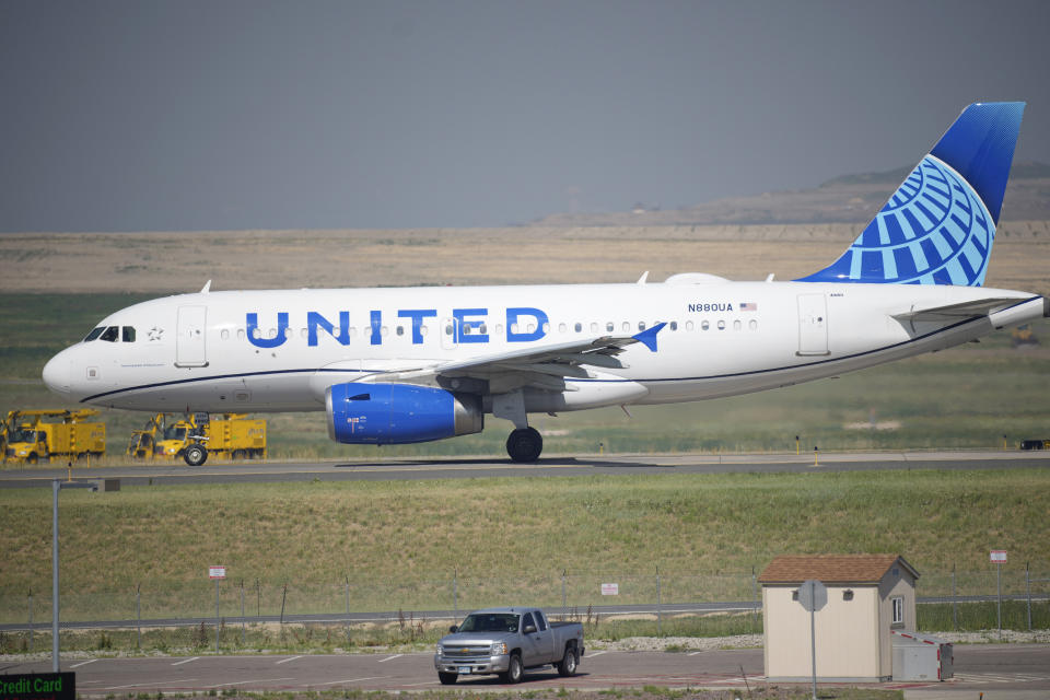 FILE - In this July 2, 2021 file photo, a United Airlines jetliner taxis down a runway for take off from Denver International Airport in Denver.  United Airlines briefly stopped flights in the U.S. and Canada on Friday, Sept. 17,  following a system outage. Amid questions of the incident on Twitter, United said that We experienced a system outage this morning, but everything is up and running and operations have resumed.  AP Photo/David Zalubowski, file)