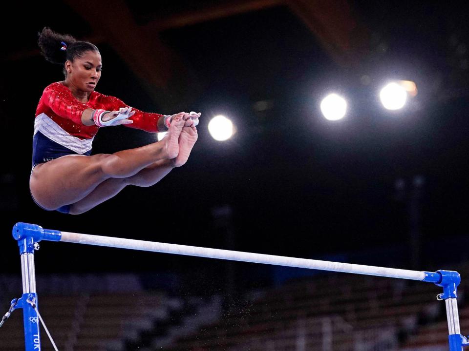 Jordan Chiles competes on the uneven bars in lieu of Simone Biles.