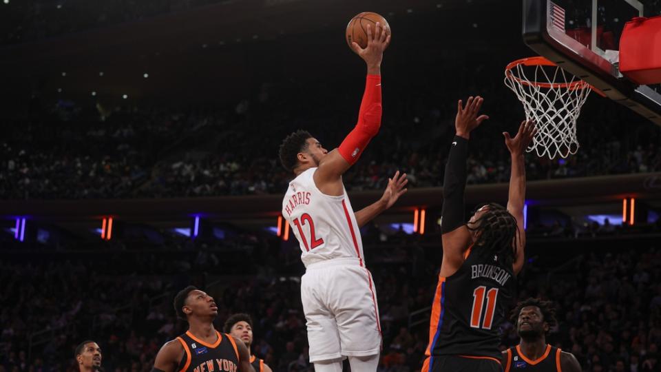 Dec 25, 2022; New York, New York, USA; Philadelphia 76ers forward Tobias Harris (12) drives to the basket as New York Knicks guard Jalen Brunson (11) defends during the first half at Madison Square Garden. Mandatory Credit: Vincent Carchietta-USA TODAY Sports