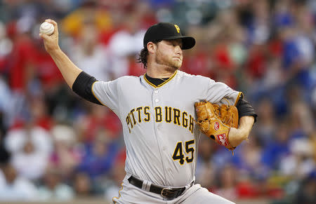 FILE PHOTO: Pittsburgh Pirates starting pitcher Gerrit Cole pitches against the Texas Rangers in the first inning of their MLB interleague baseball game in Arlington, Texas September 9, 2013. REUTERS/Mike Stone