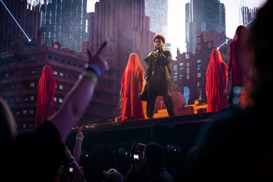 The Weeknd, an R&B and pop singer-songwriter from Toronto, Canada, performs during a sold-out show at Ford Field in Detroit on Wednesday, July 27, 2022.