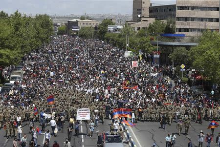 People march during a protest against the appointment of ex-president Serzh Sarksyan as the new prime minister in Yerevan, Armenia April 23, 2018. REUTERS/Vahram Baghdasaryan/Photolure