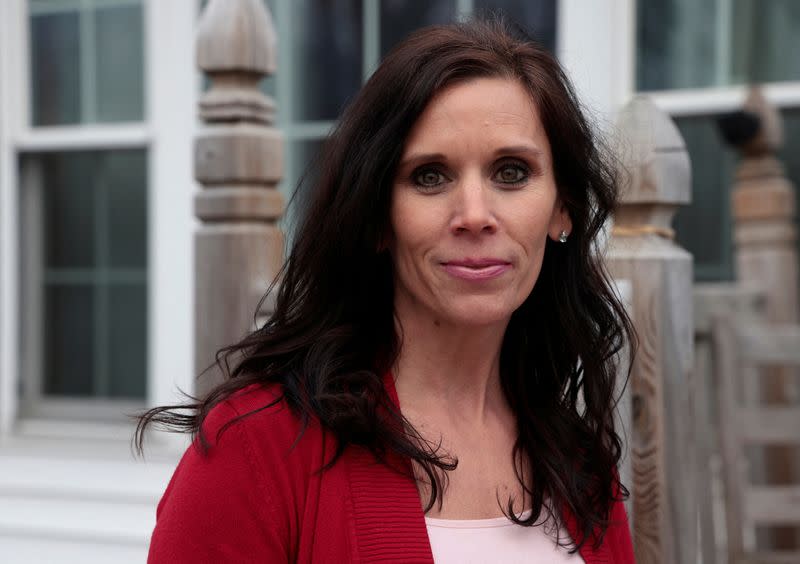 Michigan Republican Bree Moeggenberg poses in front of her home in Mount Pleasant