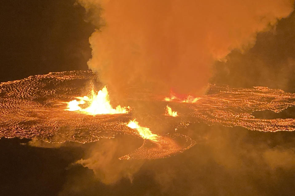 In this image provided by the U.S. Geological Survey, an eruption takes place on the summit of the Kilauea volcano in Hawaii, Wednesday, June 7, 2023. Hawaii tourism officials urged tourists to be respectful when flocking to a national park on the Big Island to get a glimpse of the latest eruption of Kilauea, one of the world's most active volcanoes. (U.S. Geological Survey via AP)