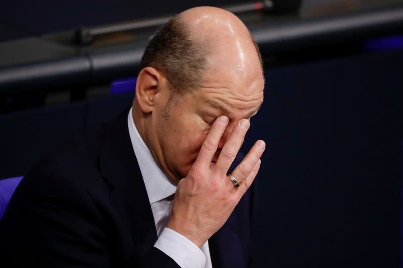 FILE PHOTO: German Finance Minister Olaf Scholz attends a session at the lower house of parliament in Berlin