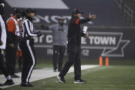 Oregon State coach Jonathan Smith calls out to players during the first half of the team's NCAA college football game against Oregon in Corvallis, Ore., Friday, Nov. 27, 2020. (AP Photo/Amanda Loman)