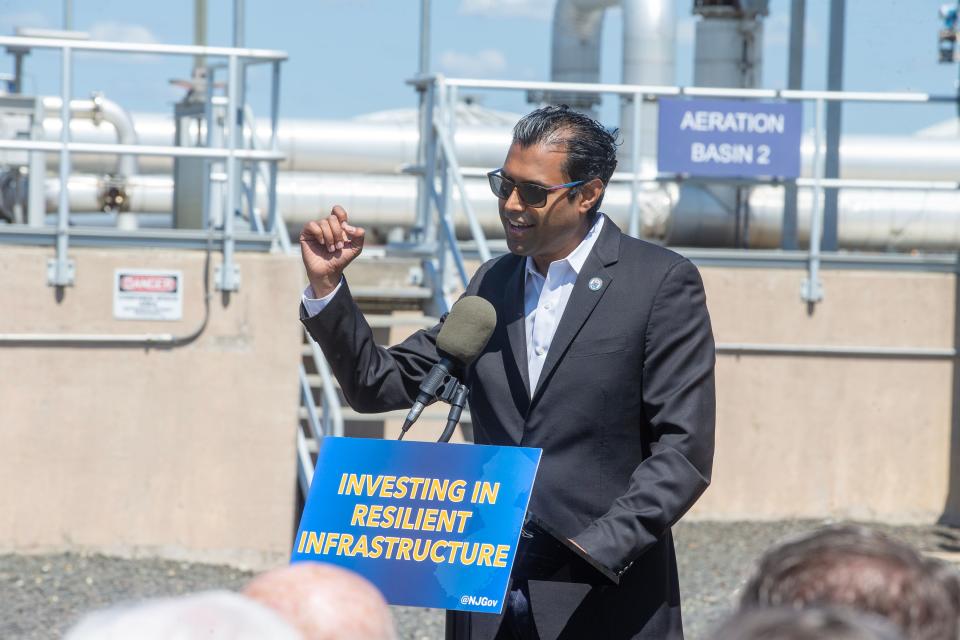 Sen. Vin Gopal speaks in June at a press conference to mark upgrades at a wastewater treatment plant in Monmouth Beach.