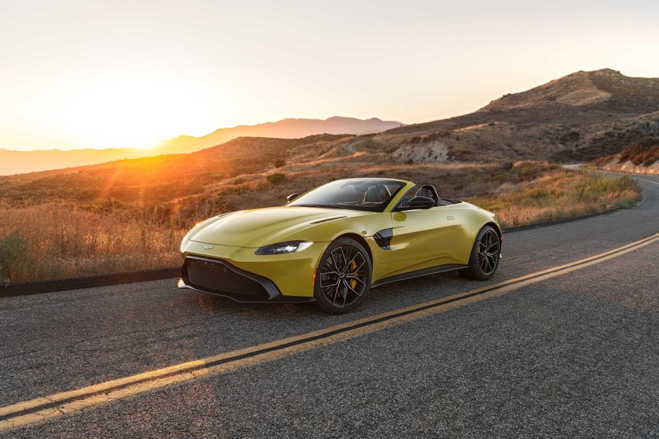 <p>A sports car's primary mission is to make the driver <em>feel </em>behind the wheel, and the beautiful 2022 Aston Martin Vantage does all that while making heads turn everywhere it goes. Its sensual shape­–available with a fixed roof or a retractable soft top­–is classic sport's car stuff, with a long hood and wide haunches. What's under that clamshell hood is almost equally as lusty: a 500-plus-hp twin-turbo V-8 sourced from <a href="https://www.caranddriver.com/mercedes-amg" rel="nofollow noopener" target="_blank" data-ylk="slk:Mercedes-AMG;elm:context_link;itc:0;sec:content-canvas" class="link ">Mercedes-AMG</a>. This vociferous mill mates with a manual or automatic transmission, but unfortunately the former is only offered on the regular coupe. For drivers looking to channel their inner Sebastian Vettel, Aston now offers a track-tuned F1 Edition with distinct styling, an enhanced chassis, and extra horsepower. While the Vantage's interior suffers from some fit-and-finish issues and uncouth wind and road noise at highway speeds, the highly customizable cabin can still be lavishly appointed. Most importantly, <a href="https://www.caranddriver.com/aston-martin" rel="nofollow noopener" target="_blank" data-ylk="slk:Aston Martin's;elm:context_link;itc:0;sec:content-canvas" class="link ">Aston Martin's</a> entry-level machine constantly manufactures smiles and stares.</p><p><a class="link " href="https://www.caranddriver.com/aston-martin/vantage" rel="nofollow noopener" target="_blank" data-ylk="slk:Review, Pricing, and Specs;elm:context_link;itc:0;sec:content-canvas">Review, Pricing, and Specs</a></p>