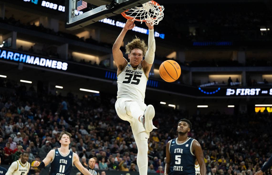 Missouri Tigers forward Noah Carter (35) dunks the ball against Utah State Aggies during a game for the NCAA Tournament at Golden 1 Center in Sacramento, Thursday, March 16, 2023.