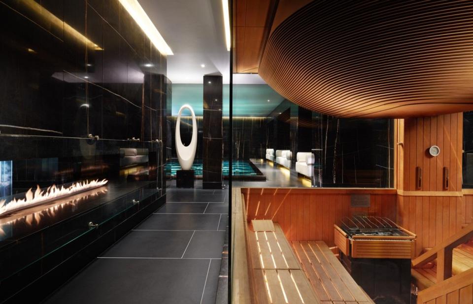 sleek spa interiors with a sauna and fireplace