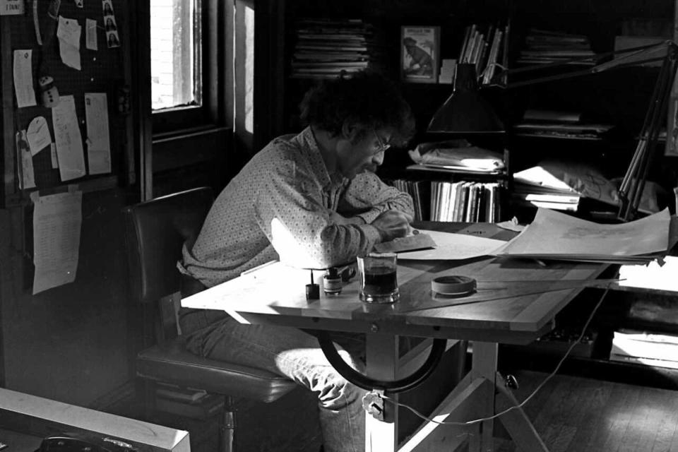 Arnold Lobel works at his drafting table in the mid '70s.<span class="copyright">Courtesy of Adam Lobel</span>