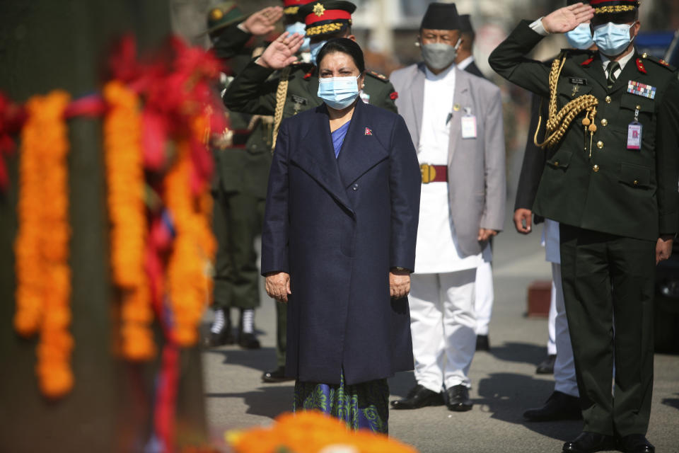 President of Nepal Bidhya Devi Bhandari pays her respects in front of a statue of King Prithvi Narayan Shah, who started the Shah dynasty in the 18th century, to mark his birth anniversary in Katmandu, Nepal, Wednesday, Jan. 11, 2023. Thousands of supporters of Nepal’s former royal family held a rally Wednesday demanding the restoration of monarchy in the Himalayan nation. The last Shah king, Gyanendra, was forced to step down and the monarchy abolished in 2008, making Nepal a republic. (AP Photo/Bikram Rai)