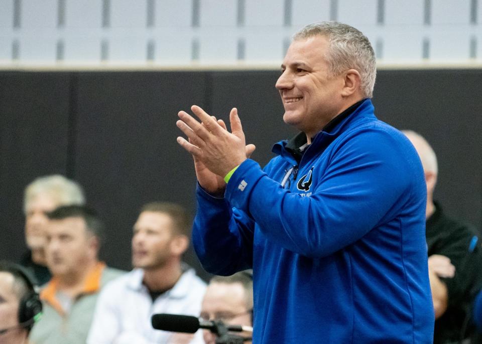 Quakertown head wrestling coach Kurt Handel is in favor of the new rule changes that add more offense to the sport.