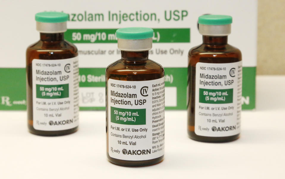 FILE - This July 25, 2014 photo shows bottles of the sedative midazolam at a hospital pharmacy in Oklahoma City. Oklahoma is one of three states where executions have gone awry this year using midazolam as part of a two- or three-drug lethal injection process. Officials in Texas and Missouri, two of the most active death penalty places, are confident in the use of their single drug pentobarbital and show no willingness to slow down. (AP Photo/File)