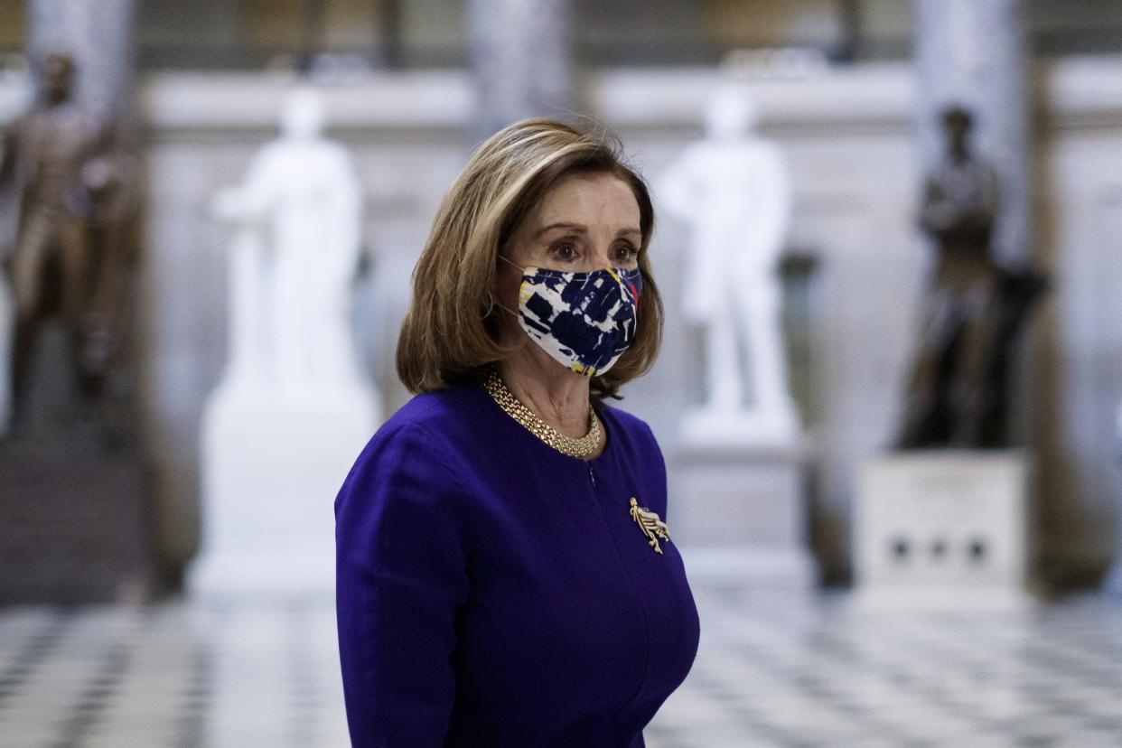 Speaker of the House Nancy Pelosi walking through the Capitol on Jan. 6, 2021.