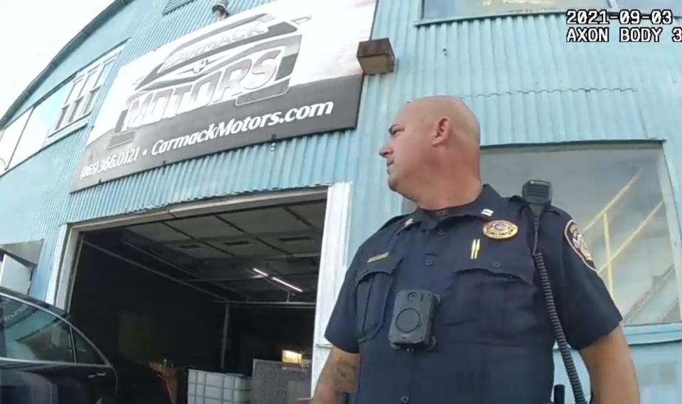 Knox County Sheriff's Office Capt. Eric Edlin wears a body camera in this screenshot from another deputy's body camera video taken during an armed raid at a South Knox County business in September 2021.