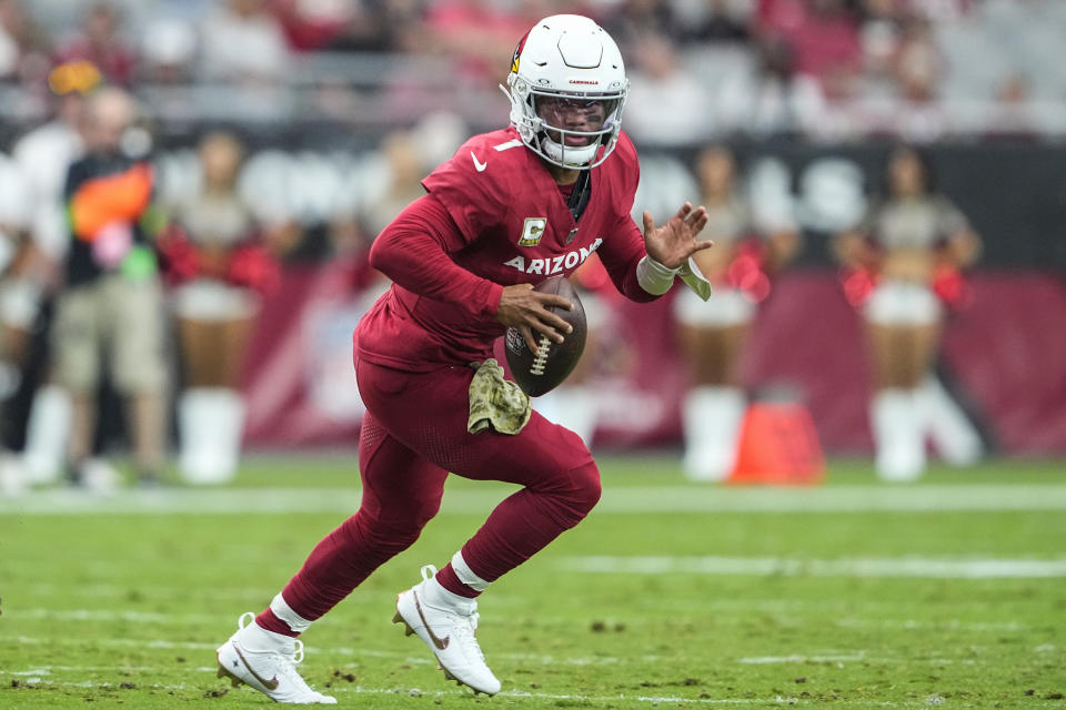 Arizona Cardinals quarterback Kyler Murray (1) runs out of the pocket against the Atlanta Falcons during the first half of an NFL football game, Sunday, Nov. 12, 2023, in Glendale, Ariz. (AP Photo/Matt York)