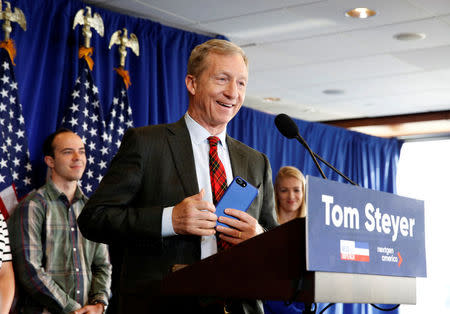 Tom Steyer, a hedge fund manager and a prominent Democratic fundraiser who has mounted a high-profile advertising campaign advocating the impeachment of U.S. President Donald Trump, holds a news conference to announce plans for his political future, in Washington, U.S., January 8, 2018. REUTERS/Joshua Roberts