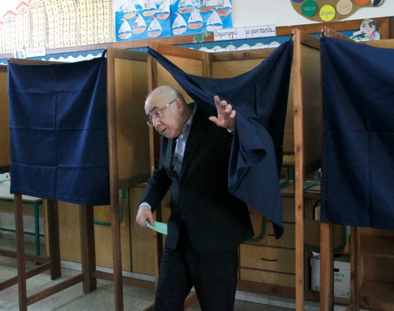 Outgoing Cypriot President of the House of Representatives, Yiannakis Omirou, votes in the southern Cypriot town of Paphos on May 22, 2016
