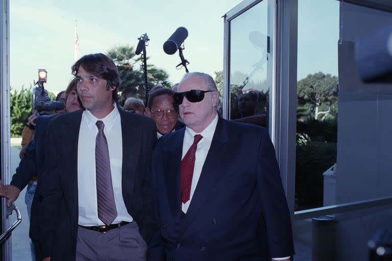 Christian with his father Marlon Brando, who described his son's childhood as 