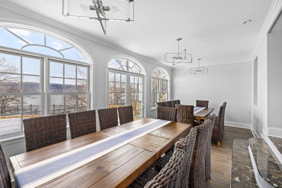 A formal dining space comes with prime views of the Hudson River. Melanie Greene/GreeneHouse NYC